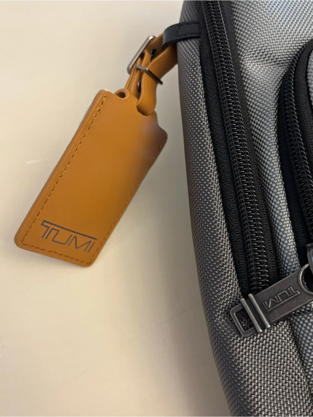 Tumi Gray Fife Slim Crossbody Sling Bag - Compact NEW